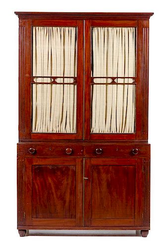 An American Empire Mahogany Bookcase Height 84 x width 49 1/4 x depth 20 1/4 inches.