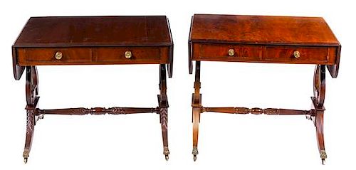 A Near Pair of American Classical Style Mahogany Drop-Leaf Tables Height of larger 28 x width 52 x depth 24 inches.