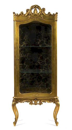 A Louis XVI Style Giltwood Vitrine, Height 71 1/4 x width 26 1/2 x depth 14 inches.