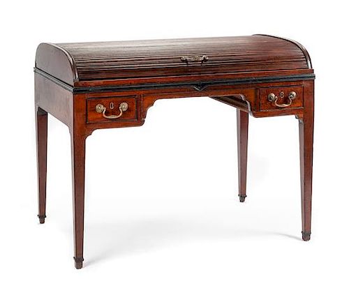 A George III Mahogany Tambour-Top Drafting Table Height 33 1/2 x width 44 x depth 28 inches.