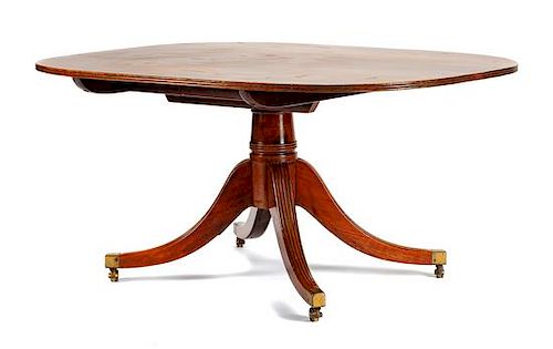 A Regency Mahogany Breakfast Table Height 28 x width 58 x depth 43 1/2 inches.