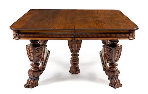 A Victorian Renaissance Revival Oak Extension Table Height 27 x width 54 x depth 54 inches.