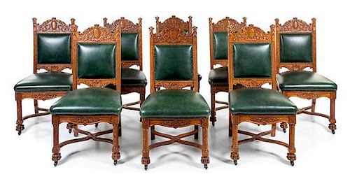A Set of Eight Victorian Renaissance Revival Oak Dining Chairs Height 42 inches.