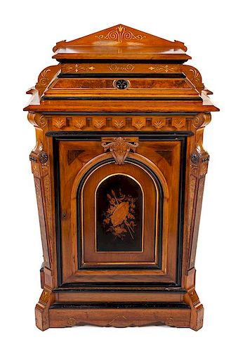 A Victorian Parcel Ebonized Marquetry Cabinet Height 54 x width 35 x depth 18 inches.