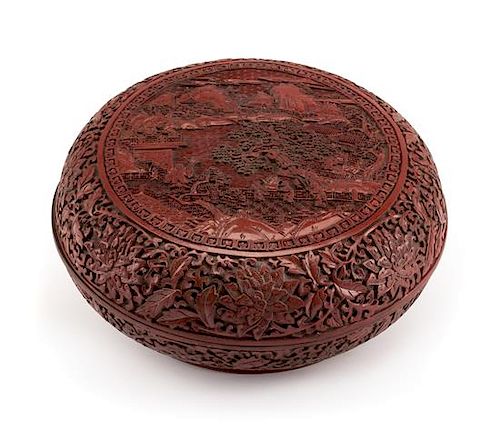 A Chinese Cinnabar Covered Box Height 5 x diameter 12 inches.