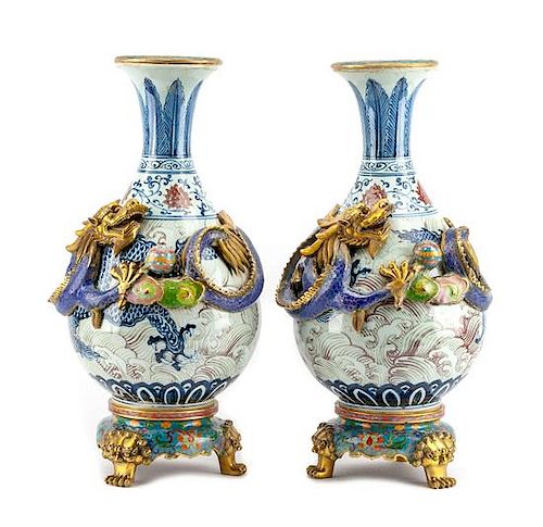 A Pair of Chinese Cloisonne Mounted Porcelain Vases Height 22 1/2 inches.