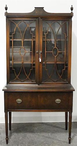 An American Mahogany Step Back Cabinet, Height 69 1/2 x width 36 x depth 16 1/4 inches.