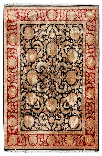 An Indo-Persian Wool Rug 12 feet 4 inches x 8 feet 8 inches.