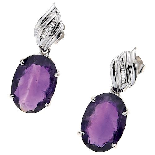 An amethyst and diamond 14K white gold pair of earrings.