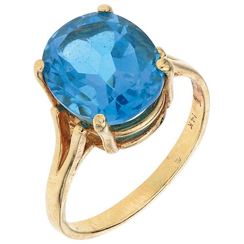 A topaz 14K yellow gold ring.