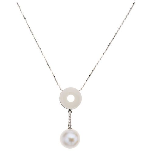 An 18K white gold choker, and cultured pearl, diamond and resin pendant.