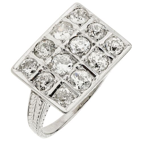 A diamond 14K white gold ring.