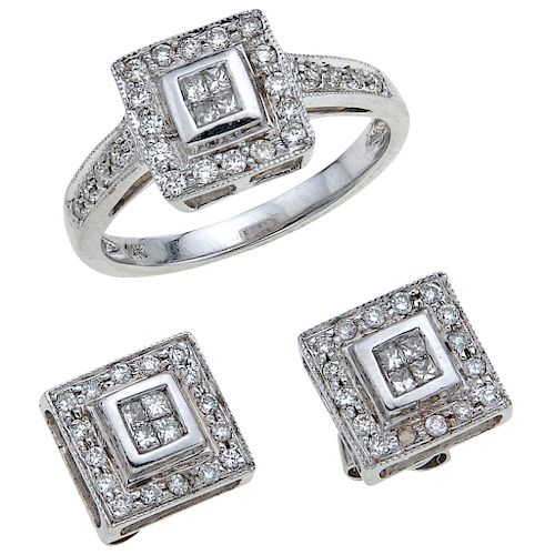 A diamond 14K white gold ring and pair of stud earrings set.