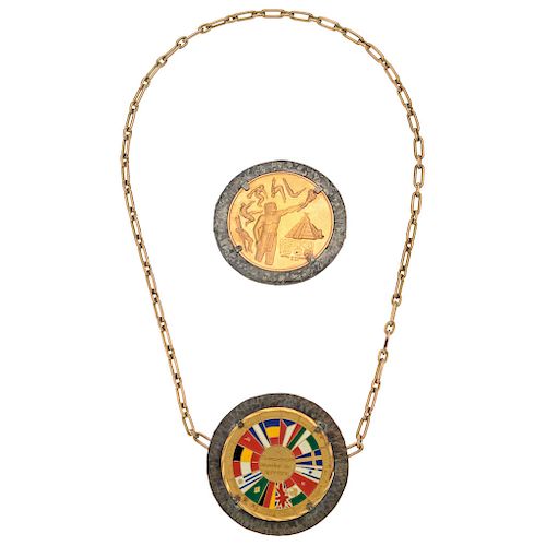 A 14K yellow gold choker with a 22K yellow gold and silver medal and an enamel 21.6K yellow gold and silver medal.