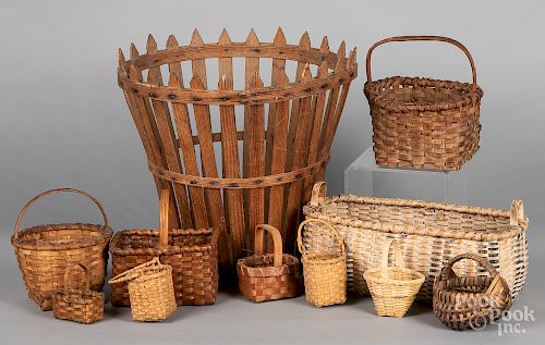 Collection of small woven baskets, etc.