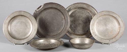 Six pewter chargers and deep dishes, 9"-15" dia.