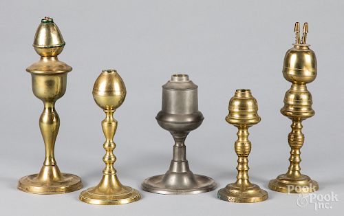 Four brass fluid lamps, etc.