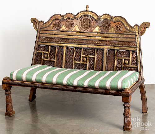 Indian carved and brass mounted bench