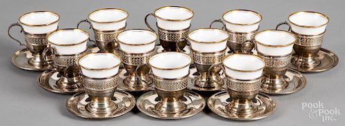Sterling silver demitasse cups and saucers, etc.