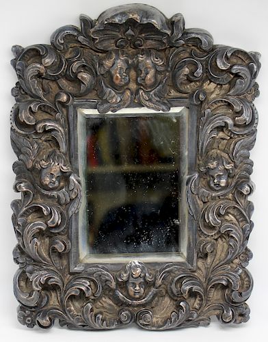 High Relief Mirror with Putti.