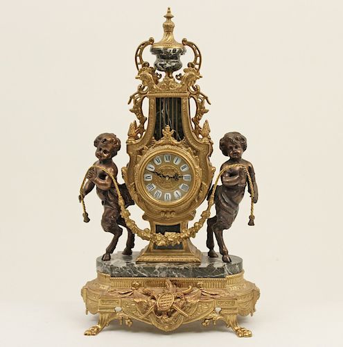 FRENCH STYLE GILT METAL AND BLACK MARBLE CLOCK