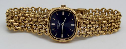 JEWELRY. Patek Philippe Ellipse 18kt Gold Watch.