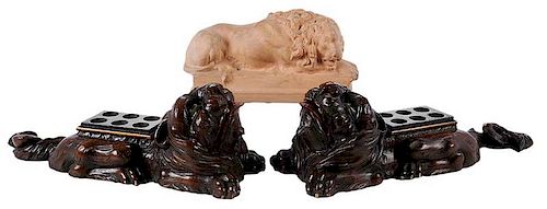 Three Figural Recumbent Lions
