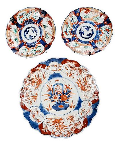 Three Imari Decorated Plates