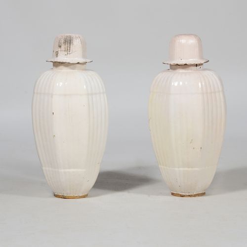 Pair of White Glazed Pottery Jars and Covers