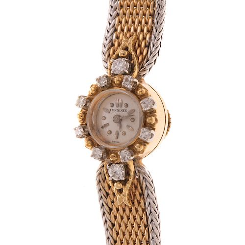 A Ladies Longines Watch with Diamonds in 18K