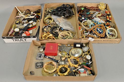 Tray lot of costume jewelry including Kenneth Lane earrings and two YSL belt buckles, and wristwatches. 
Provenance: Estate of Kenne...