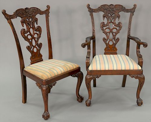 Set of twelve mahogany Chippendale style dining chairs.