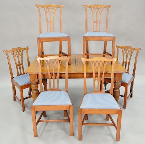 Mahogany dining table with two 17 inch leaves and six Chippendale style chairs. ht. 28 in., top: 47" x 58"