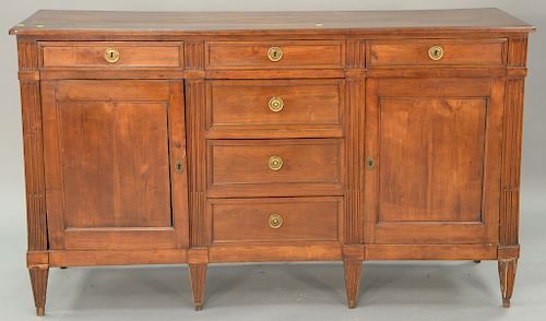 Louis XVI style fruitwood credenza with doors and drawers, 19th century. ht. 40 in. wd. 67 1/2 in. dp. 18 in. 
Provenance: Estate of...