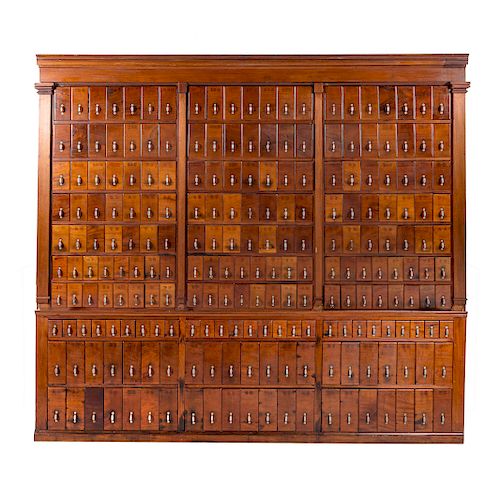 Large American walnut apothecary cabinet