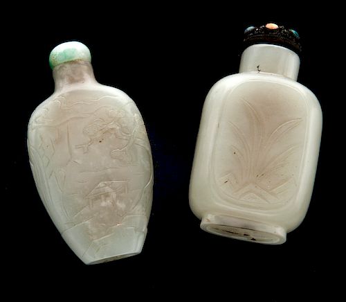 Two Chinese carved jade snuff bottles,