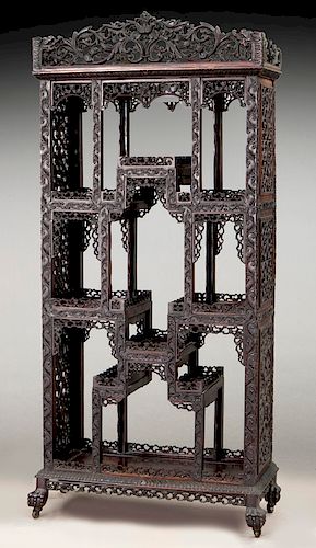 Chinese carved hardwood curio cabinet.