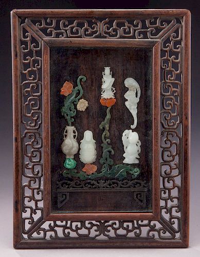 Chinese Qing jade plaque inlaid in a rosewood
