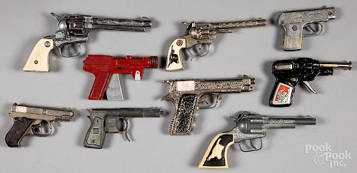 Collection of nine cap guns