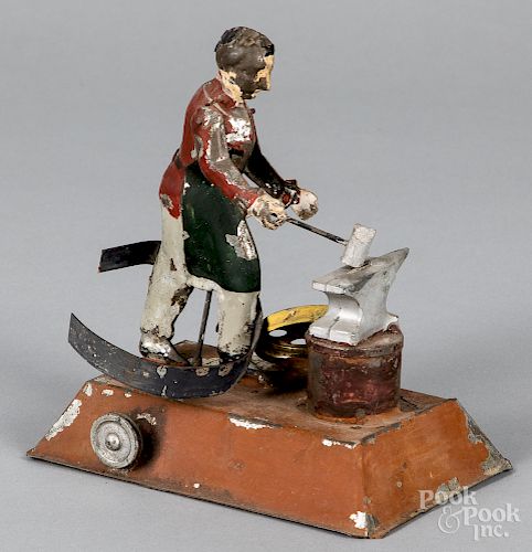Arnold painted tin wheelwright steam toy accessory
