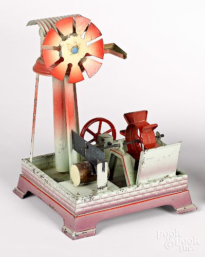Falk painted and embossed tin sawmill steam toy