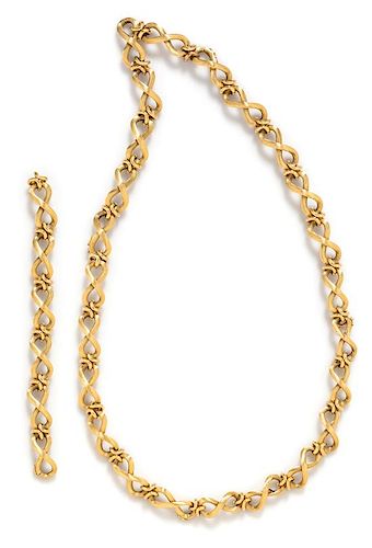 An 18 Karat Yellow Gold Convertible Longchain Necklace/Bracelet, Carlo Weingrill, 103.90 dwts.