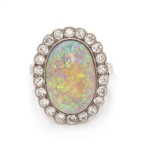 A Platinum, Opal and Diamond Ring, 3.85 dwts.