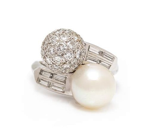 A Platinum, Cultured Pearl and Diamond 'Toi et Moi' Ring, 6.75 dwts.