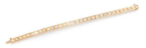 A 14 Karat Yellow Gold and Diamond Line Bracelet, 10.70 dwts.