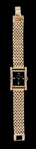 A Retro 14 Karat Yellow Gold and Diamond Wristwatch, Tavannes,
