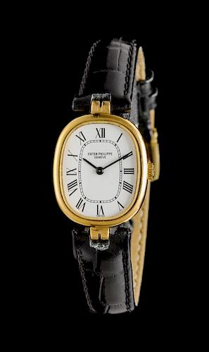 An 18 Karat Yellow Gold Ref. 4564 Ellipse Wristwatch, Patek Philippe,