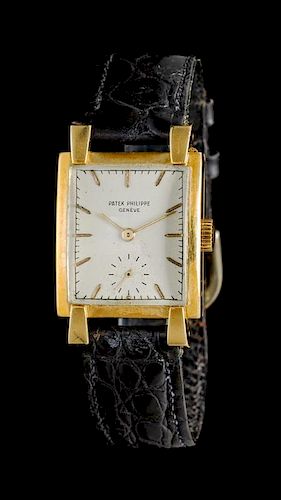 An 18 Karat Yellow Gold Ref. 2427 Wristwatch, Patek Philippe, Circa 1951,