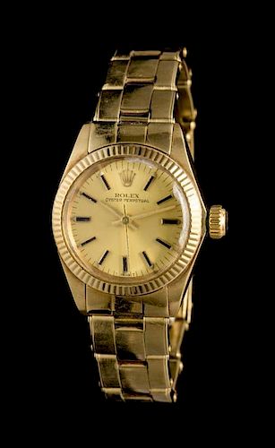 A 14 Karat Yellow Gold Ref. 6719 Oyster Perpetual Wristwatch, Rolex,