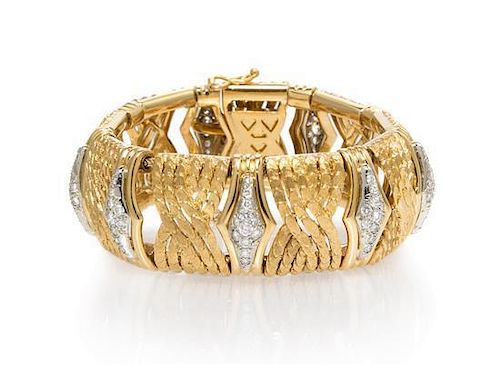 * An 18 Karat Yellow Gold and Diamond Bracelet, 54.85 dwts.